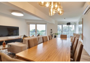 VENTA - Piso exclusivo. Dos dormitorios.  Vista franca al rio.  Amplio balcon corrido.  Amenities. Cochera.  BARRIO MARTIN. ENTREGA INMEDIATA